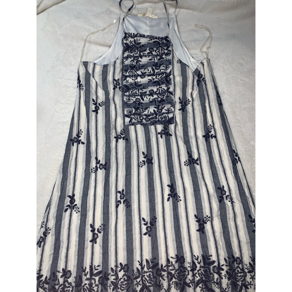 Francesca’s floral navy stripped dress